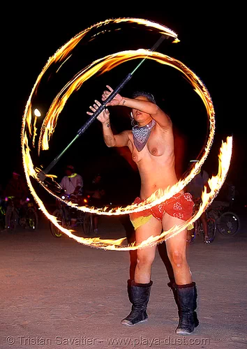 burning man - shireen spinning a fire staff, burning man at night, circle, fire dancer, fire dancing, fire performer, fire spinning, fire staff, ring, shireen, spinning fire, topless, woman