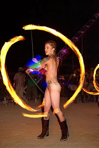 burning man - spinning fire poi - tattoos - woman, burning man at night, fire dancer, fire dancing, fire performer, fire poi, fire spinning, nude, spinning fire, tattooed, tattoos, topless, woman