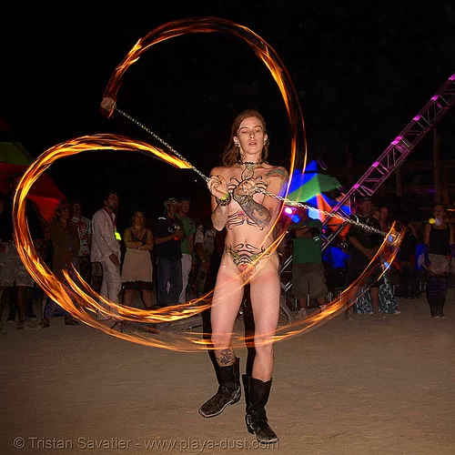 burning man - spinning fire poi - tattoos - woman, burning man at night, fire dancer, fire dancing, fire performer, fire poi, fire spinning, nude, spinning fire, tattooed, tattoos, topless, woman